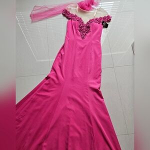 Brand new!!Beautiful pink gown.